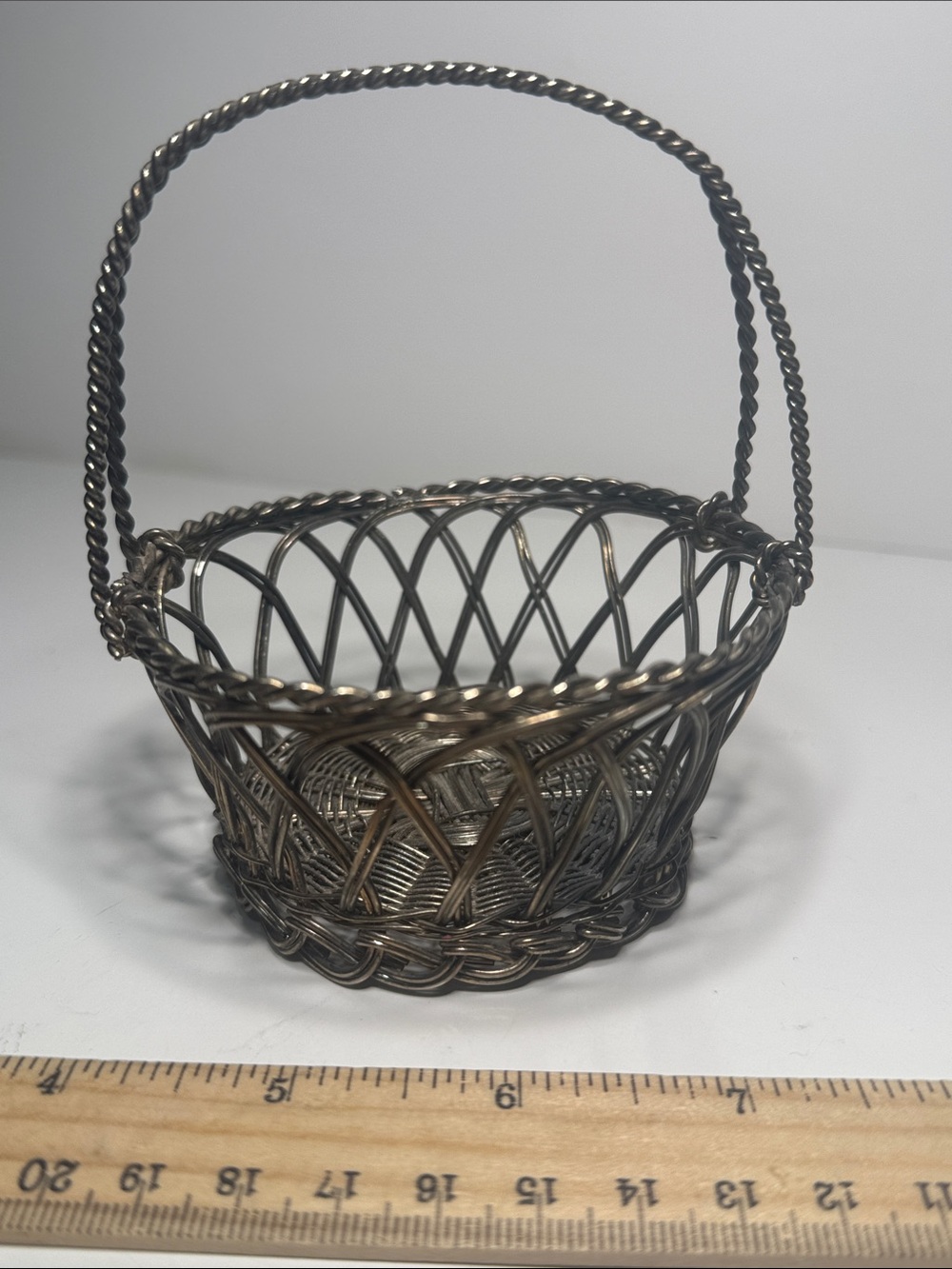 Vintage handwoven metal basket adorable and collectible